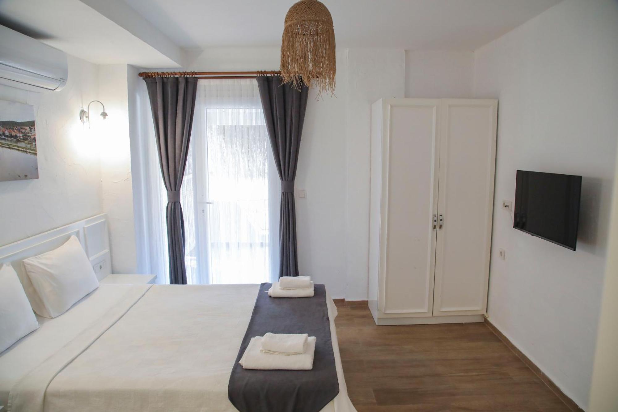 Londia Otel Алачати Экстерьер фото